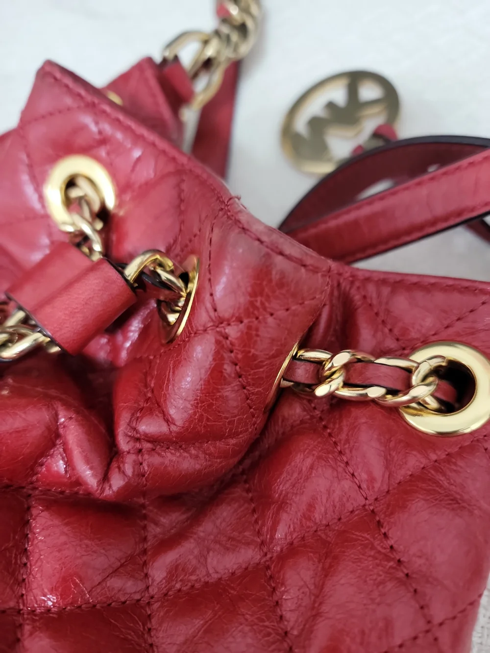 Michael Kors Red Quilted Leather Drawstring Shoulder Bag with Gold Chain